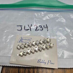 2 RHINESTONE ENCRUSTED BOBBY PINS